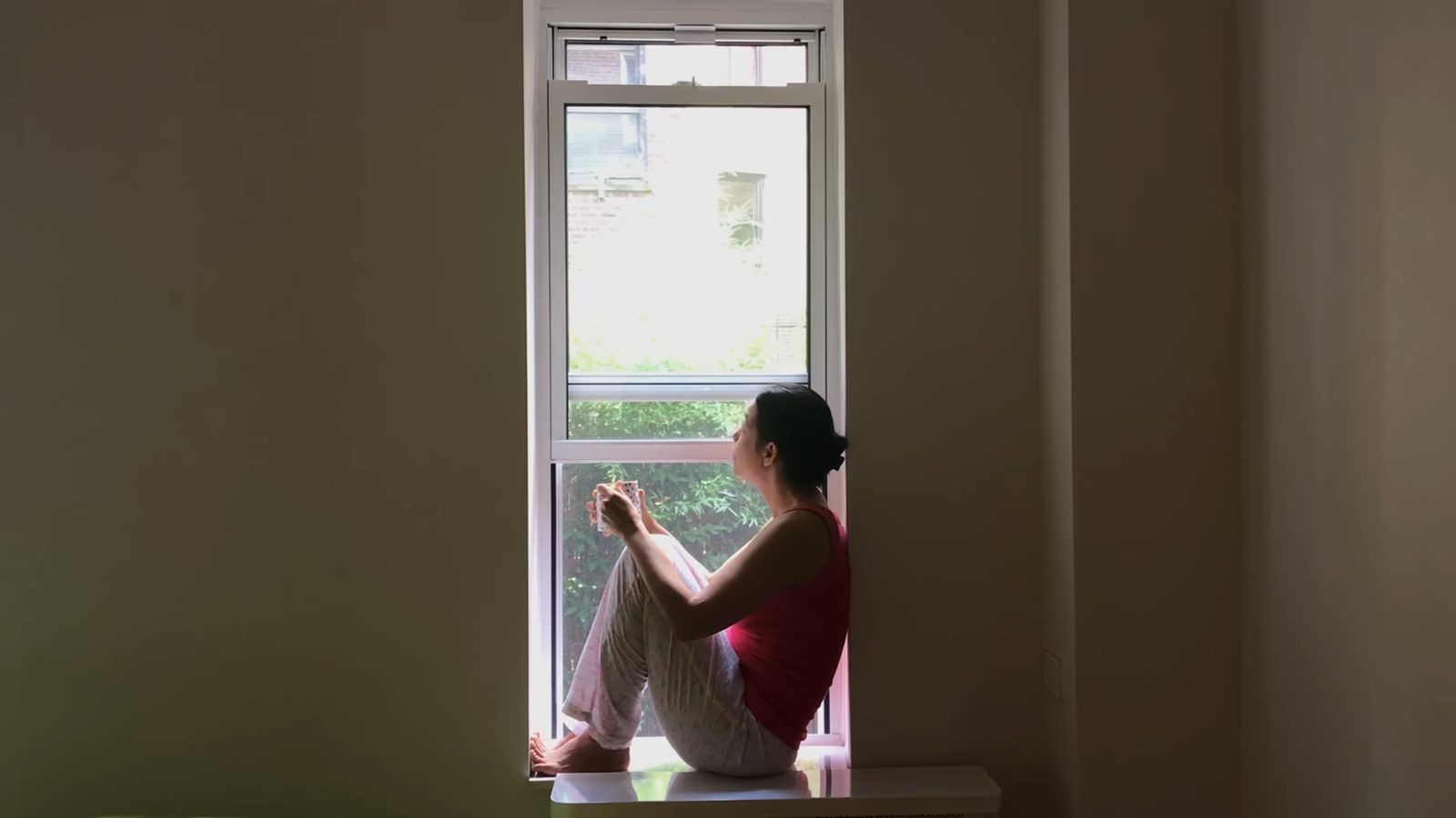 Gredivel Vasquez as the Woman in the Window in Life in a Day 2020 (Ridley Scott / Kevin Macdonald)