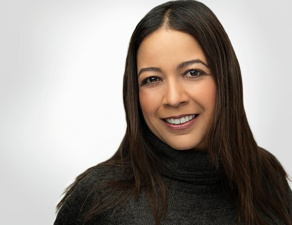 Gredivel Vasquez headshot — turtleneck